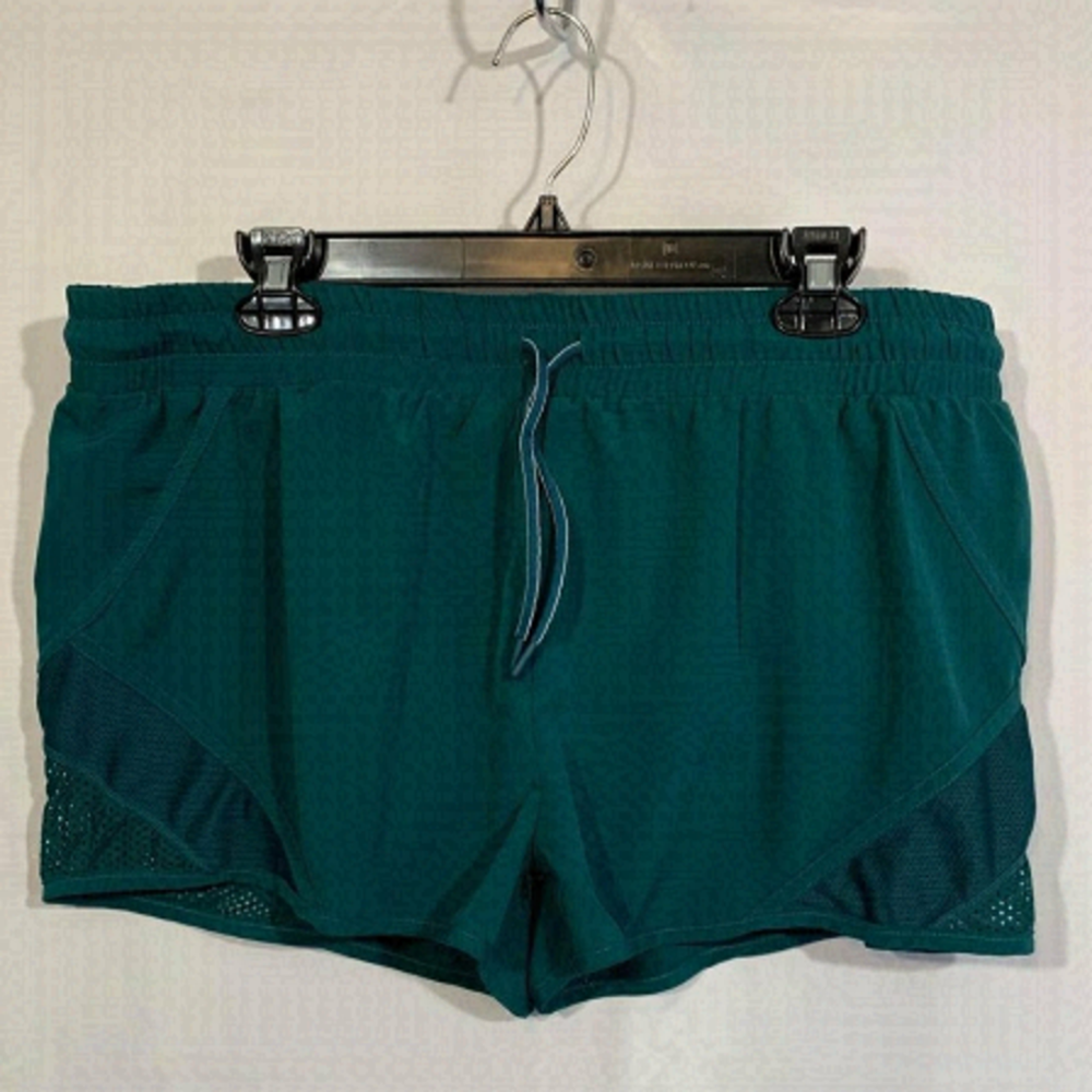 Mta sports woman’s teal running shorts. Lined. Sheer side panels. Drawstring.